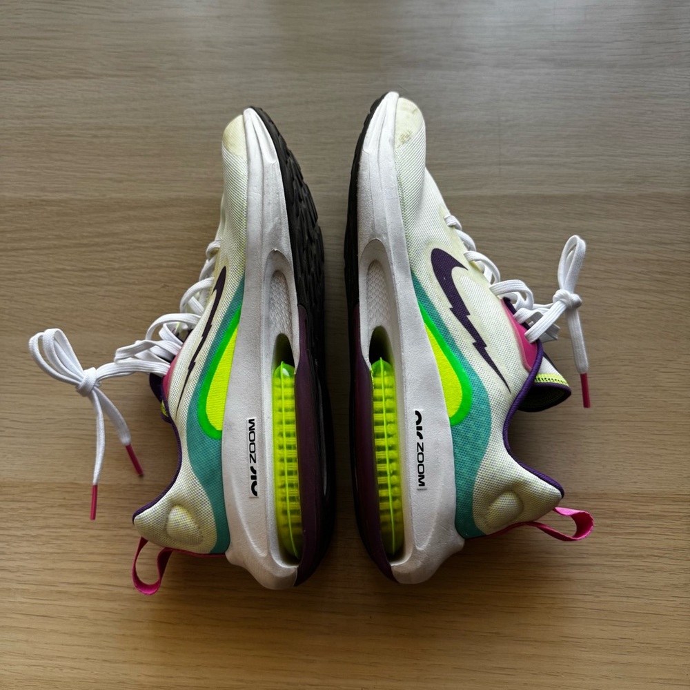 Nike kids Air Zoom Athletic Shoes - White, Green, and Purple size 6Y